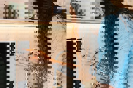 Tattoo man pushing electronic pin pad